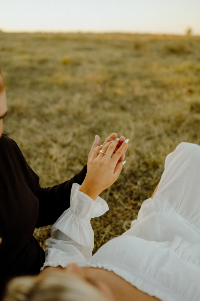 Authentic and candid moment of a couple during their ranch engagement session in Oklahoma