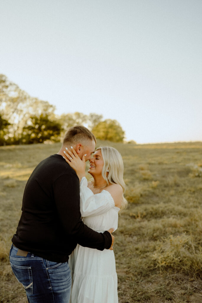 Authentic and candid moment of a couple during their rustic engagement session in Oklahoma
