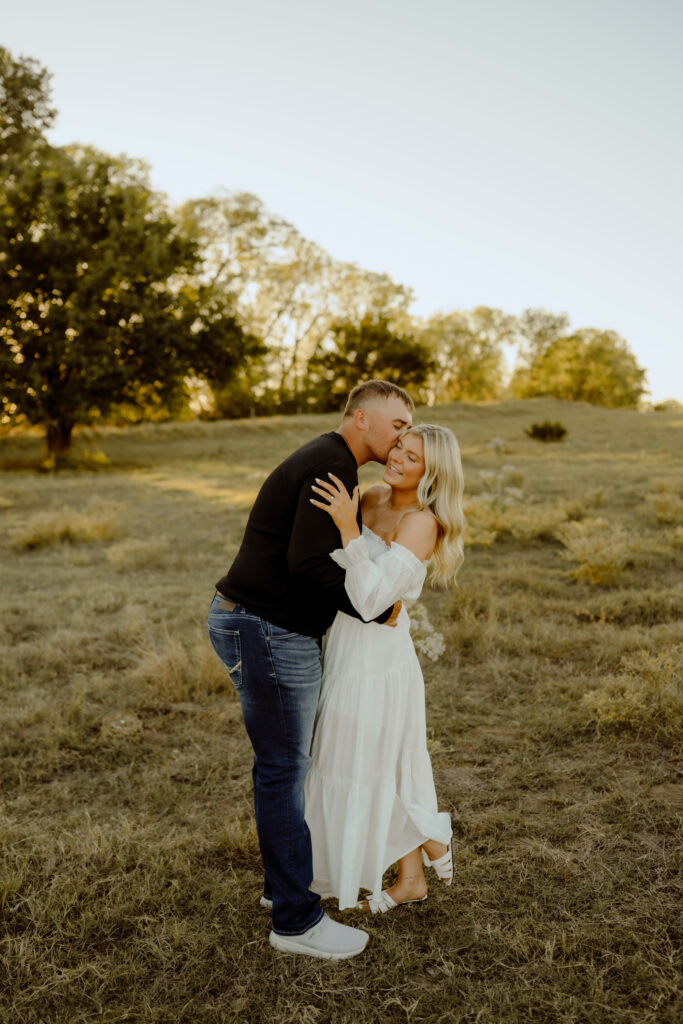 Authentic and candid moment of a couple during their western engagement session in Oklahoma