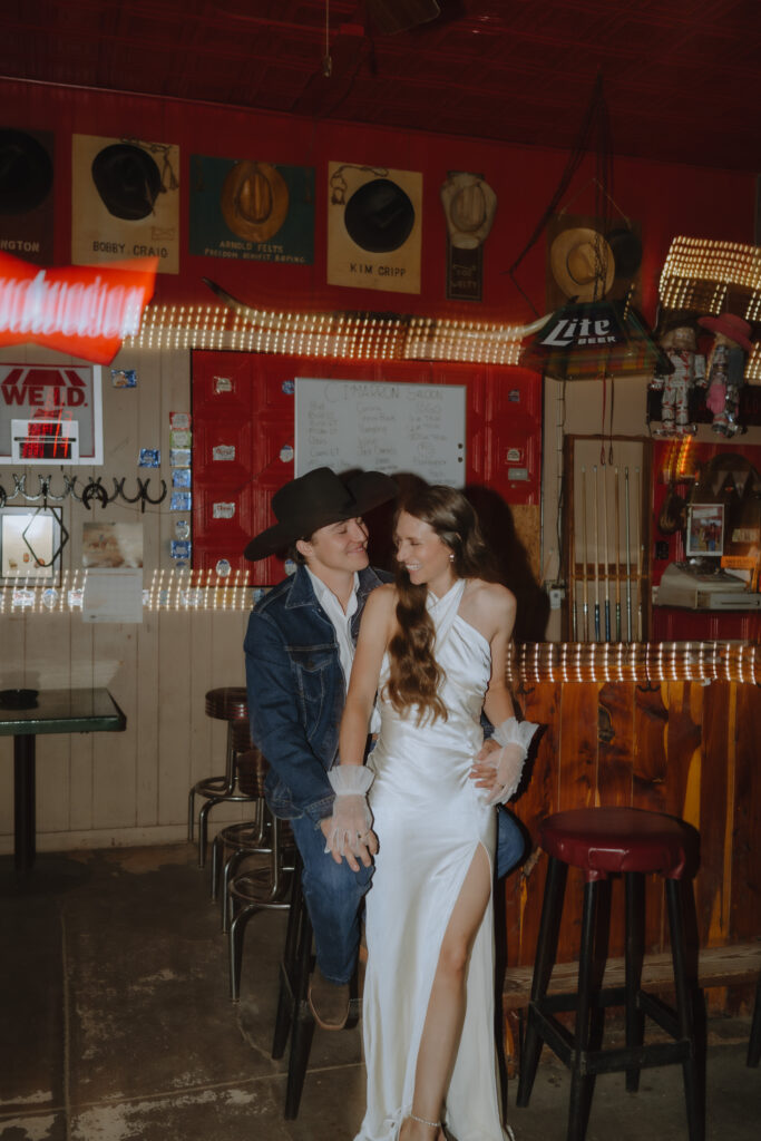 western bar engagement photo outfit