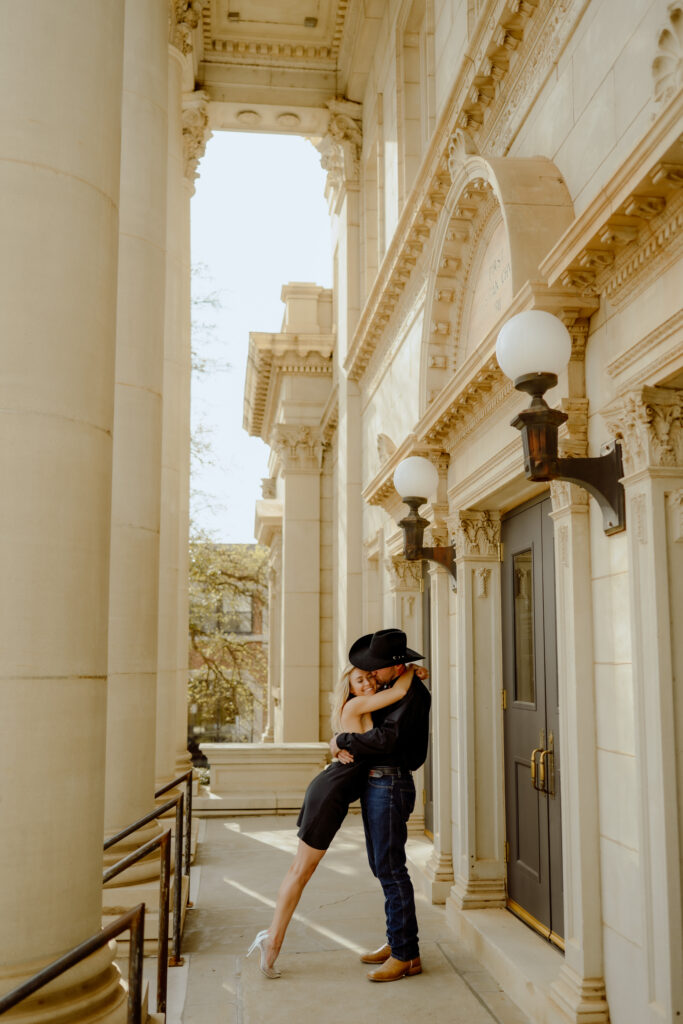 Photo of Downtown Engagement Session in OKC couple hugging