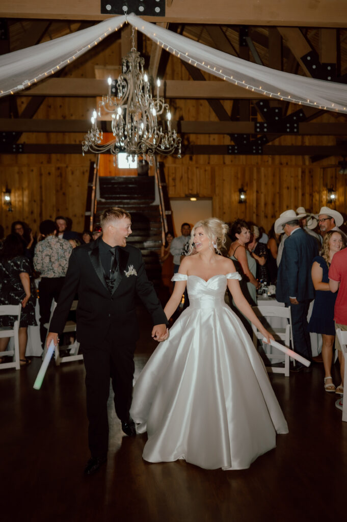 bride and groom entrance to reception at the springs wedding venue