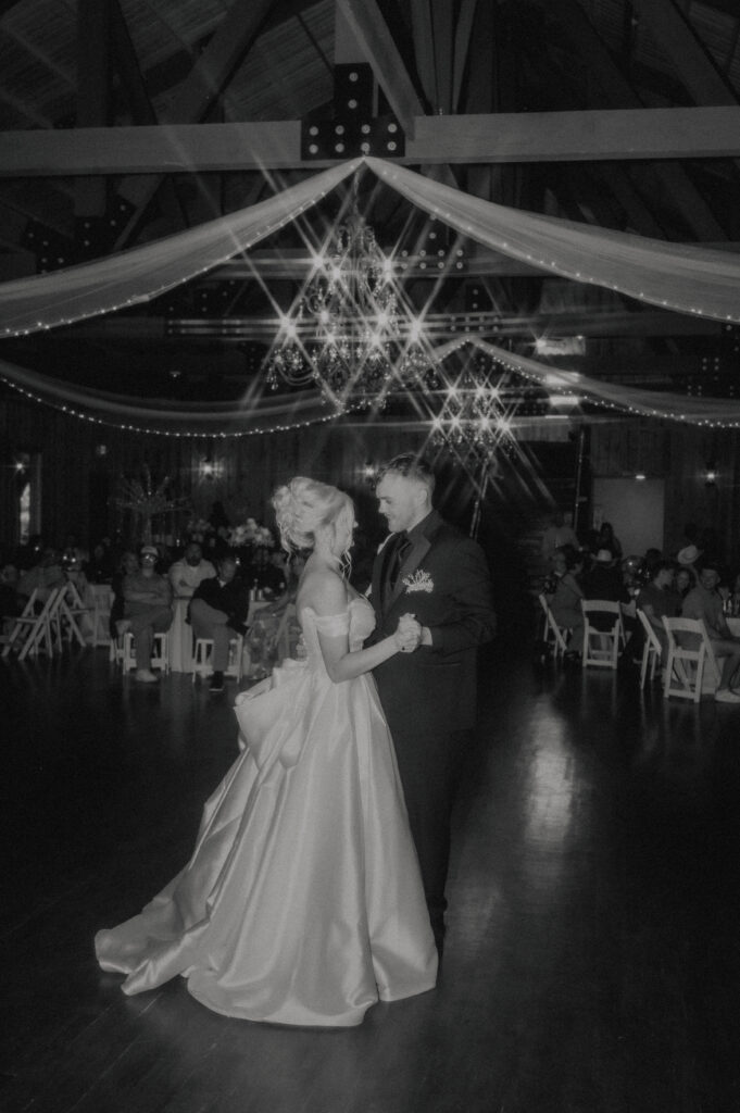 bride and groom first dance at the springs reception space