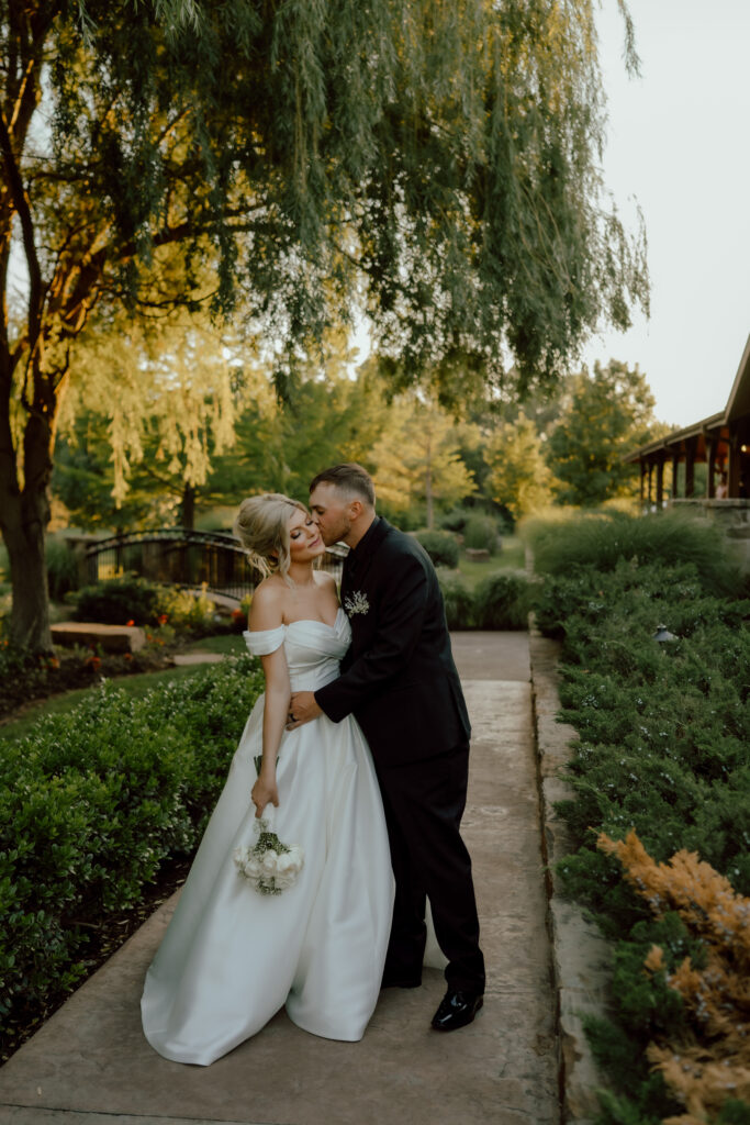 bride and groom portrait in the gardens at the springs