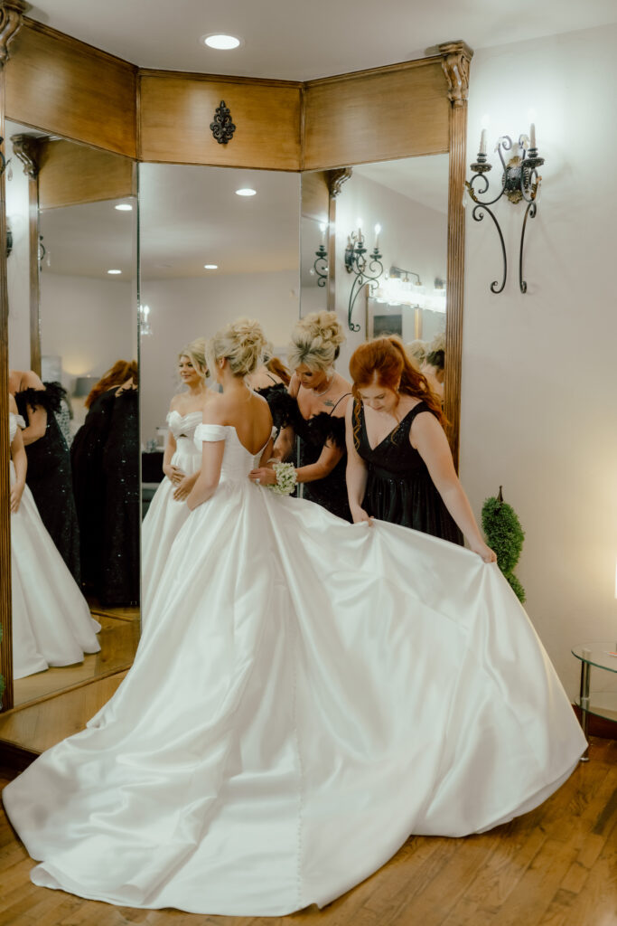 bride getting ready at the springs wedding venue bridal suite
