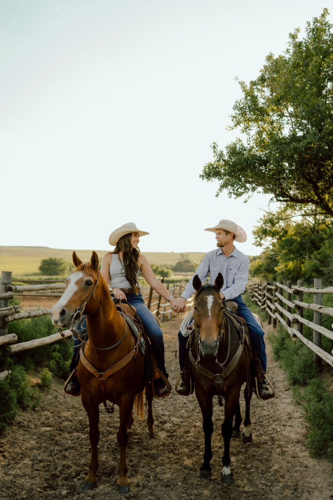 western couples photo riding horses