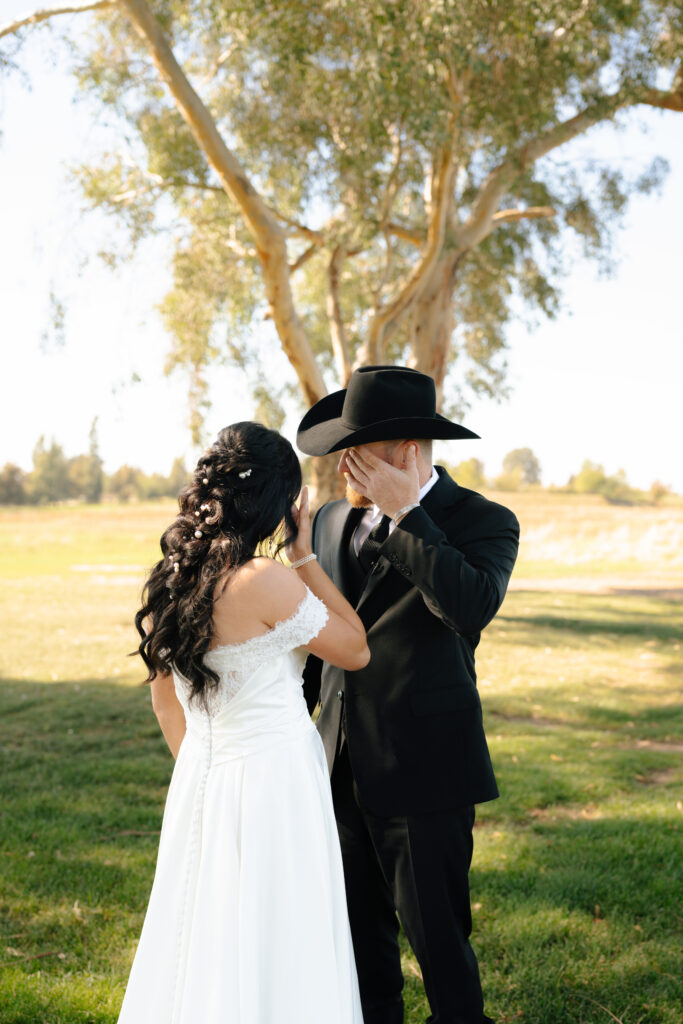 bride and groom emotional first look