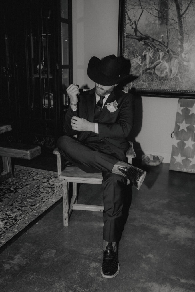 western elegance groom getting ready