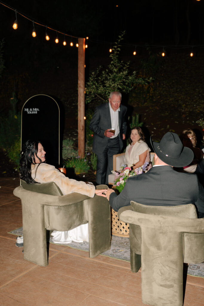 bride and groom mingling with guests