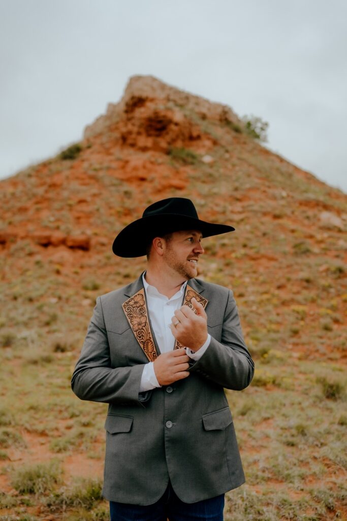 tooled jacket on cowboy groom